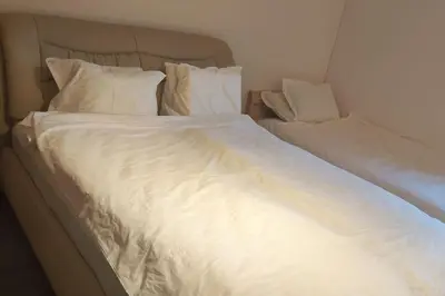 Ein Bett oder Betten in einem Zimmer der Unterkunft Ferienwohnung mit Garten