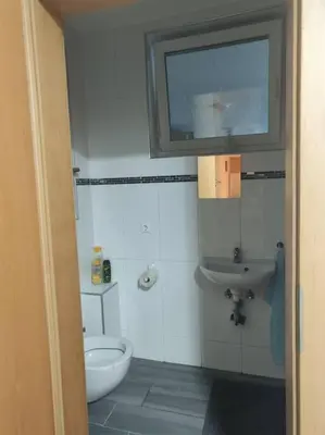 Ein Badezimmer in der Unterkunft Ferienwohnung mit Garten