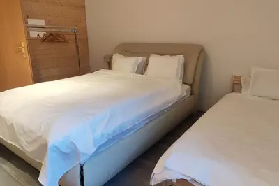 Ein Bett oder Betten in einem Zimmer der Unterkunft Ferienwohnung mit Garten