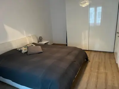 Ein Bett oder Betten in einem Zimmer der Unterkunft Wohnung 1210