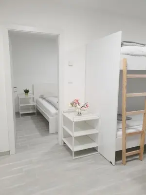 Ein Bett oder Betten in einem Zimmer der Unterkunft Business Westbahnhof R
