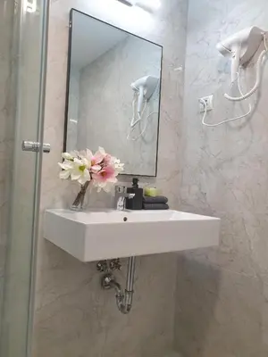 Ein Badezimmer in der Unterkunft Business Westbahnhof R
