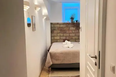 Ein Bett oder Betten in einem Zimmer der Unterkunft Cozy and stylish flat close to Schoenbrunn Palace