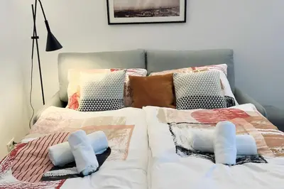 Ein Bett oder Betten in einem Zimmer der Unterkunft Cozy and stylish flat close to Schoenbrunn Palace