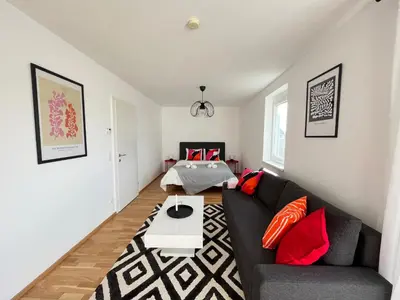 Ein Sitzbereich in der Unterkunft Penthouse near Central Station with free parking