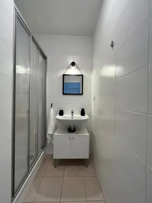 Ein Badezimmer in der Unterkunft Penthouse near Central Station with free parking