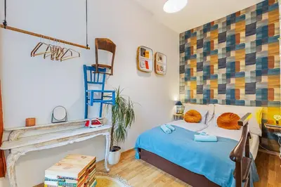 Ein Bett oder Betten in einem Zimmer der Unterkunft Einzigartiges Upcycling DREAM Apt.