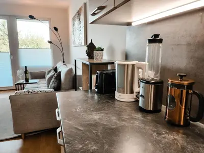 Ein Sitzbereich in der Unterkunft Vienna Green - Modern New Apartment, Old Danube