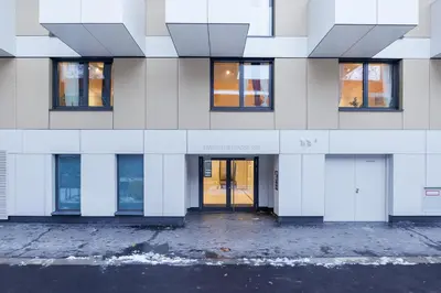 Eine Fassade oder ein Eingang zu Zoder Apartments
