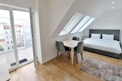 Ein Bett oder Betten in einem Zimmer der Unterkunft Vienna Lotus Apartments