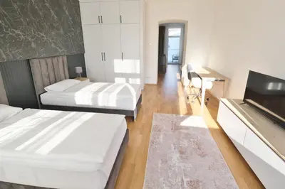 Ein Bett oder Betten in einem Zimmer der Unterkunft Vienna Lotus Apartments