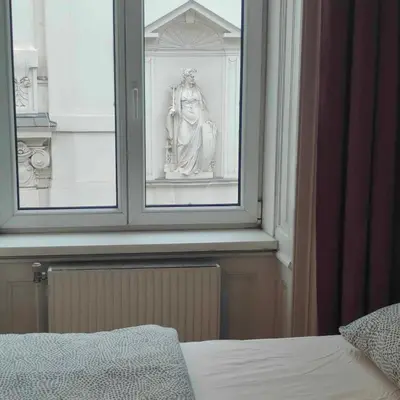 Ein Bett oder Betten in einem Zimmer der Unterkunft Large 4 room apartment in the center of Vienna