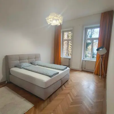 Ein Bett oder Betten in einem Zimmer der Unterkunft Large 4 room apartment in the center of Vienna