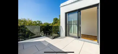 Ein Balkon oder eine Terrasse in der Unterkunft Bennett Apartment