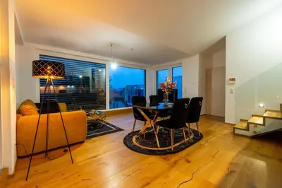 Ein Sitzbereich in der Unterkunft Bennett Apartment