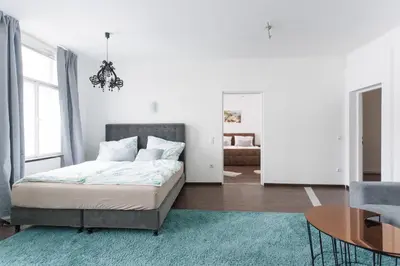 Ein Bett oder Betten in einem Zimmer der Unterkunft Central, modern, big apartment