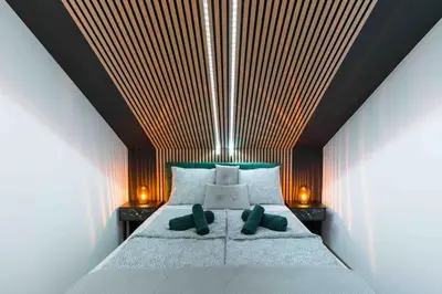 Ein Bett oder Betten in einem Zimmer der Unterkunft „Royal Loft View“ Rooftop Nähe Stadtzentrum