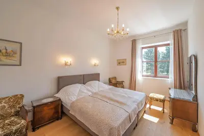 Ein Bett oder Betten in einem Zimmer der Unterkunft Villa Musik - historical apartments, Baden