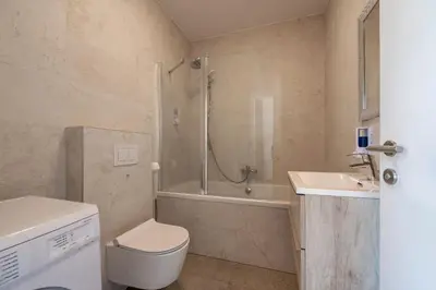 Ein Badezimmer in der Unterkunft Villa Musik - historical apartments, Baden