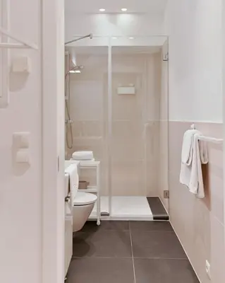 Ein Badezimmer in der Unterkunft Stylish & Modern Apartment - Private Garden