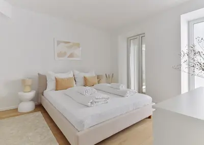 Ein Bett oder Betten in einem Zimmer der Unterkunft Stylish & Modern Apartment - Private Garden