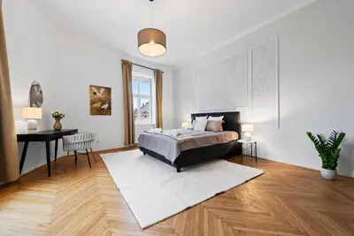 Ein Bett oder Betten in einem Zimmer der Unterkunft Rochus-Market City Apartment is Calling - by 4ty3 Apartments