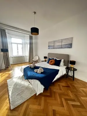 Ein Bett oder Betten in einem Zimmer der Unterkunft Luxury 3 bedroom apartment near Schönbrunn Palace