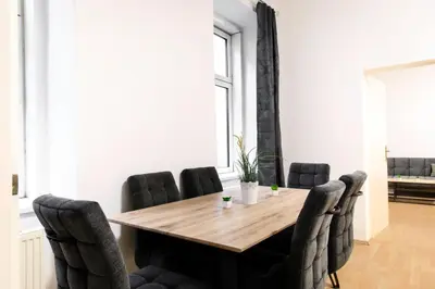 Ein Sitzbereich in der Unterkunft Royal-Haven Apartment