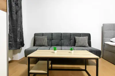 Ein Sitzbereich in der Unterkunft Royal-Haven Apartment
