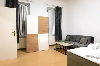 Ein Bett oder Betten in einem Zimmer der Unterkunft Royal-Haven Apartment