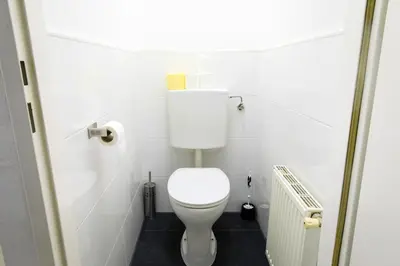 Ein Badezimmer in der Unterkunft Royal-Haven Apartment