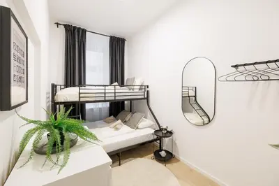 Ein Bett oder Betten in einem Zimmer der Unterkunft Central City Style Rooms by Home2