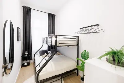 Ein Bett oder Betten in einem Zimmer der Unterkunft Central City Style Rooms by Home2
