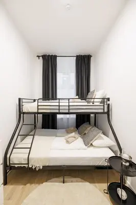 Ein Bett oder Betten in einem Zimmer der Unterkunft Central City Style Rooms by Home2