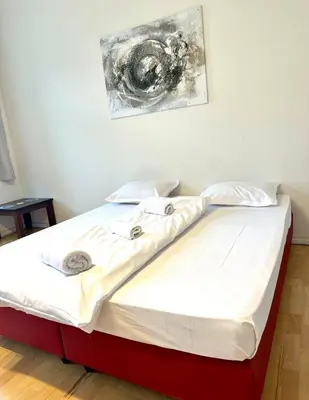 Ein Bett oder Betten in einem Zimmer der Unterkunft LAX Apartments
