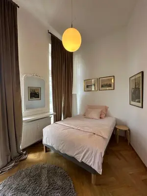Ein Bett oder Betten in einem Zimmer der Unterkunft Royal Residence Schönbrunn