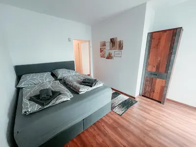 Ein Bett oder Betten in einem Zimmer der Unterkunft Vienna Shopping Center 3 Apartment