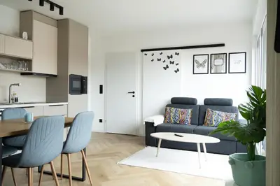 Ein Sitzbereich in der Unterkunft SI apartments - Smart Inn