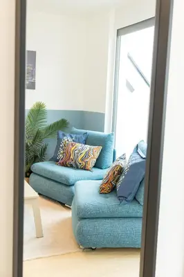 Ein Sitzbereich in der Unterkunft SI apartments - Smart Inn