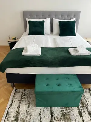 Ein Bett oder Betten in einem Zimmer der Unterkunft Anna Luxury Apartment