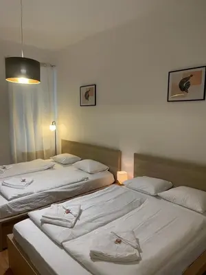Ein Bett oder Betten in einem Zimmer der Unterkunft Cozy 5-Person apartment in Vienna 2