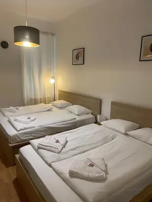 Ein Bett oder Betten in einem Zimmer der Unterkunft Cozy 5-Person apartment in Vienna 2