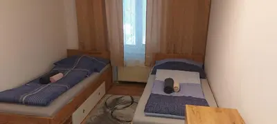 Ein Bett oder Betten in einem Zimmer der Unterkunft Villa SCS Nähe