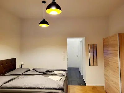 Ein Bett oder Betten in einem Zimmer der Unterkunft Kienmayer Apartment Vienna