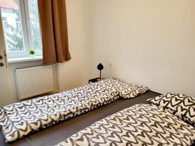 Ein Bett oder Betten in einem Zimmer der Unterkunft Kienmayer Apartment Vienna