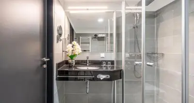 Ein Badezimmer in der Unterkunft PLAZA Residence Wiener Neustadt
