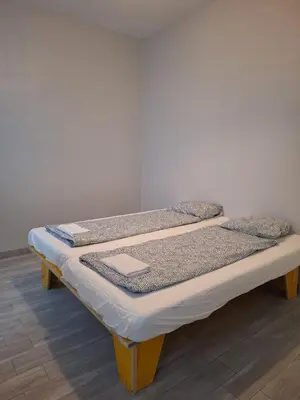 Ein Bett oder Betten in einem Zimmer der Unterkunft Donau Zentrum W