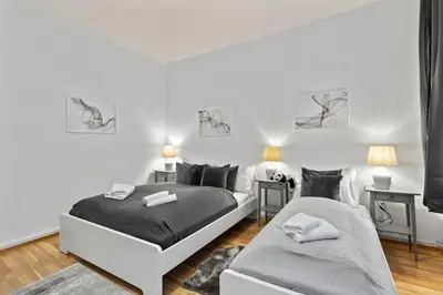 Ein Bett oder Betten in einem Zimmer der Unterkunft Modern Apartment close to Center - 2BR