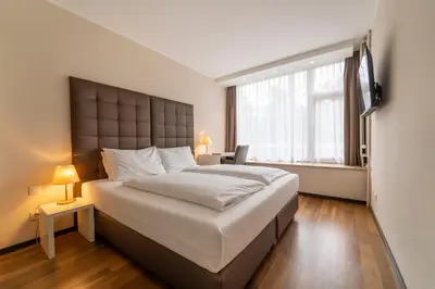 Ein Bett oder Betten in einem Zimmer der Unterkunft Pakat Residences