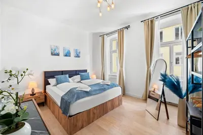 Ein Bett oder Betten in einem Zimmer der Unterkunft Traum-Wohnung, 63m², TOP Öffi-Anbindung, Smart-TV.
